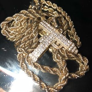 Iced out uzi gold
